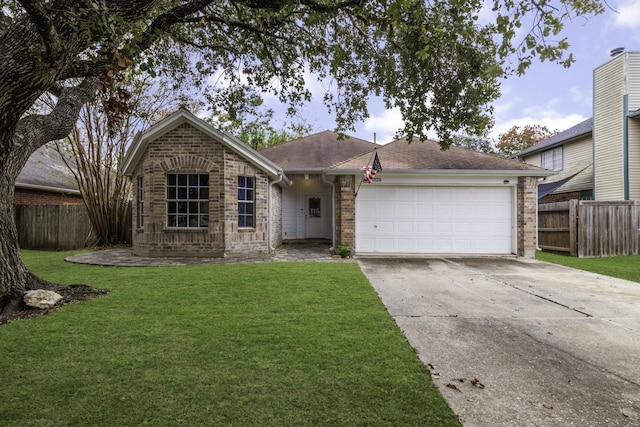 single story home with a garage, brick siding, fence, driveway, and a front lawn