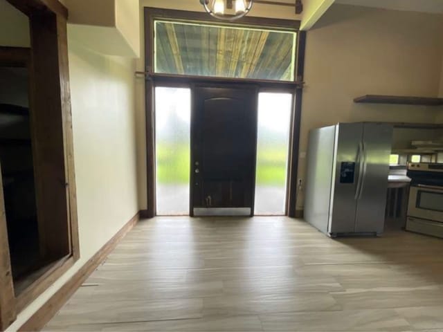 foyer entrance featuring light wood-type flooring