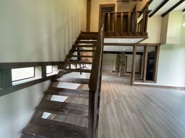 stairway with wood-type flooring