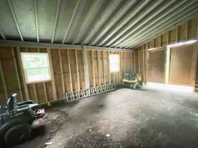 miscellaneous room featuring lofted ceiling