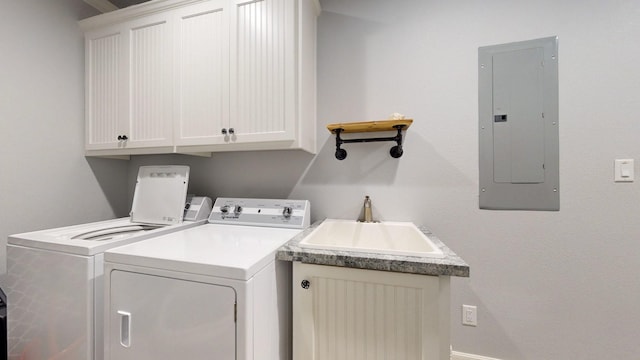1819 Redfish Ln, Crystal Beach, TX 77650 - laundry area with electric panel, washer and clothes dryer, and cabinet space