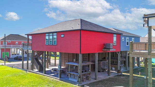 exterior space with cooling unit, a patio, and a wooden deck