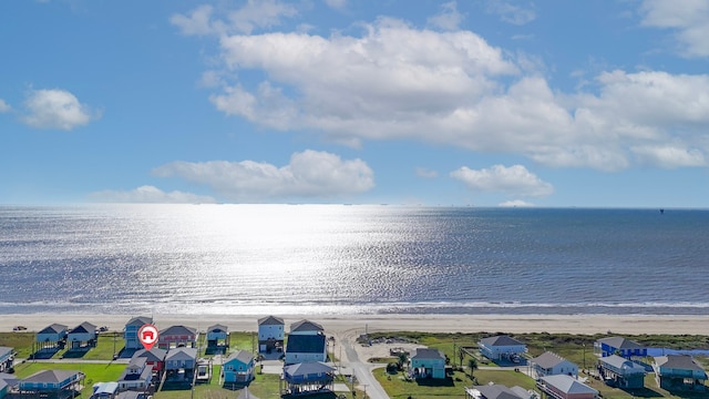 property view of water featuring a beach view