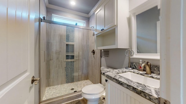 1819 Redfish Ln, Crystal Beach, TX 77650 - bathroom featuring a stall shower, toilet, vanity, and crown molding