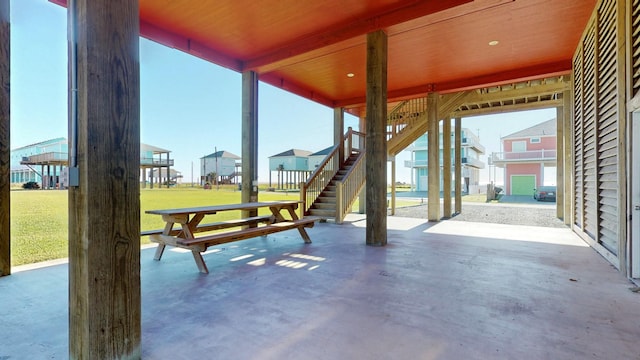 1819 Redfish Ln, Crystal Beach, TX 77650 - view of patio / terrace with stairs and a residential view