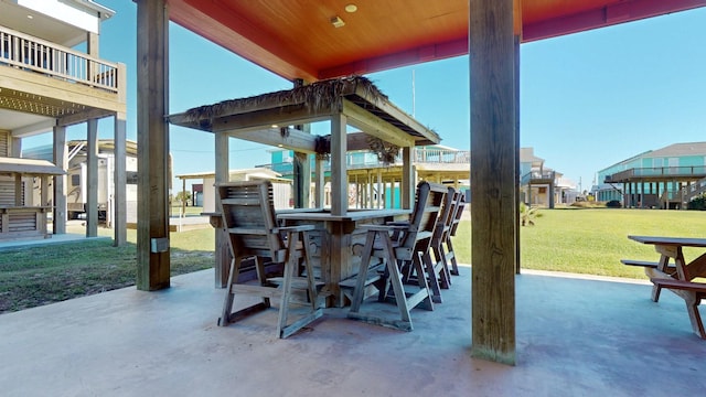1819 Redfish Ln, Crystal Beach, TX 77650 - view of patio featuring a residential view