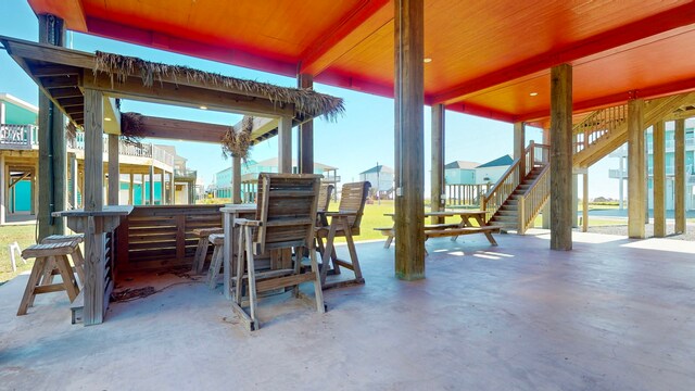 view of patio with an outdoor bar