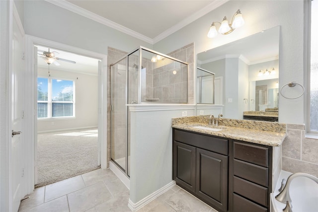 bathroom featuring vanity, an enclosed shower, ornamental molding, and ceiling fan