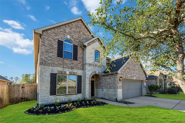 view of front of property with a garage and a front lawn