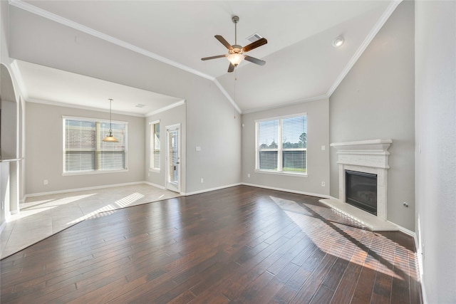 unfurnished living room featuring hardwood / wood-style floors, ceiling fan, and ornamental molding