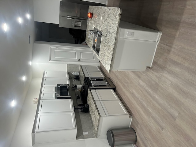 kitchen with white cabinetry