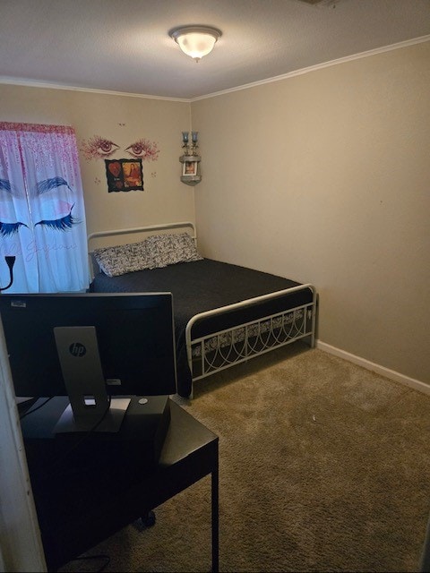 bedroom featuring carpet flooring and ornamental molding