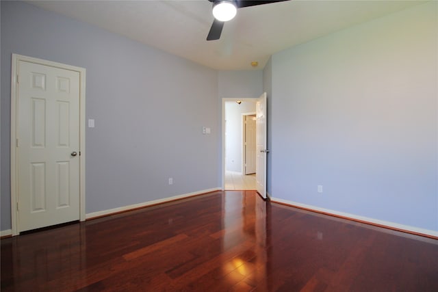 unfurnished room featuring hardwood / wood-style flooring and ceiling fan