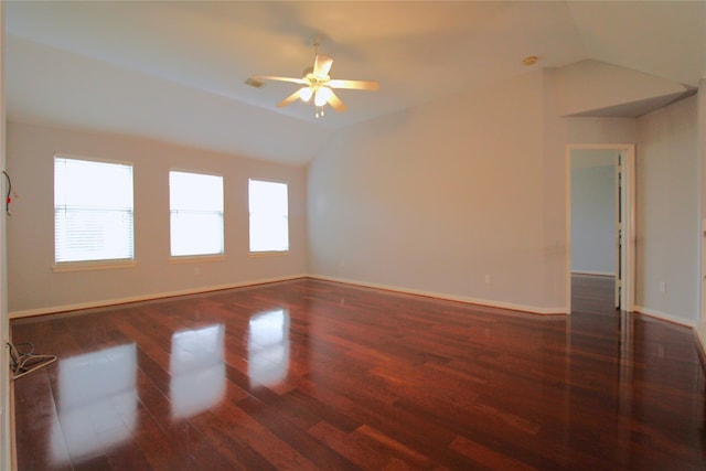 unfurnished room with dark hardwood / wood-style floors, ceiling fan, and lofted ceiling