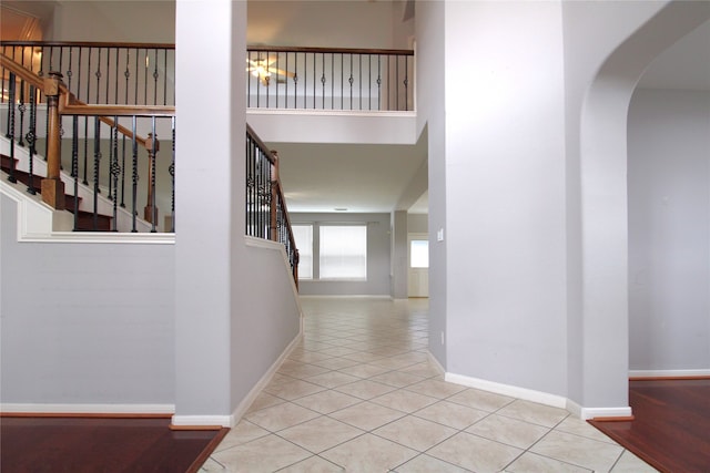 hallway with light tile patterned floors