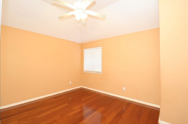 empty room featuring ceiling fan and wood-type flooring