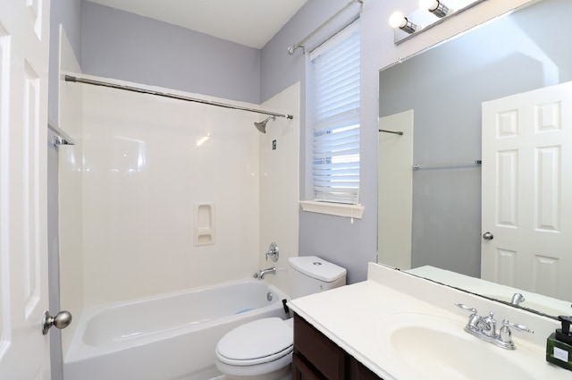 full bathroom with bathtub / shower combination, vanity, and toilet