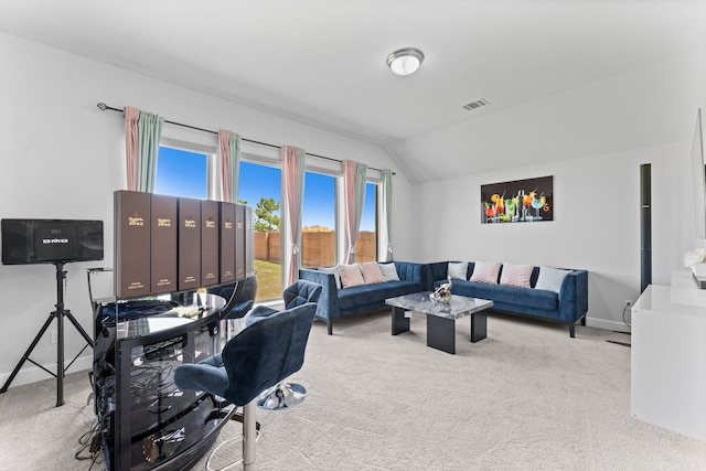 office featuring light colored carpet and lofted ceiling