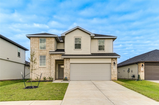 view of property with a front yard and a garage