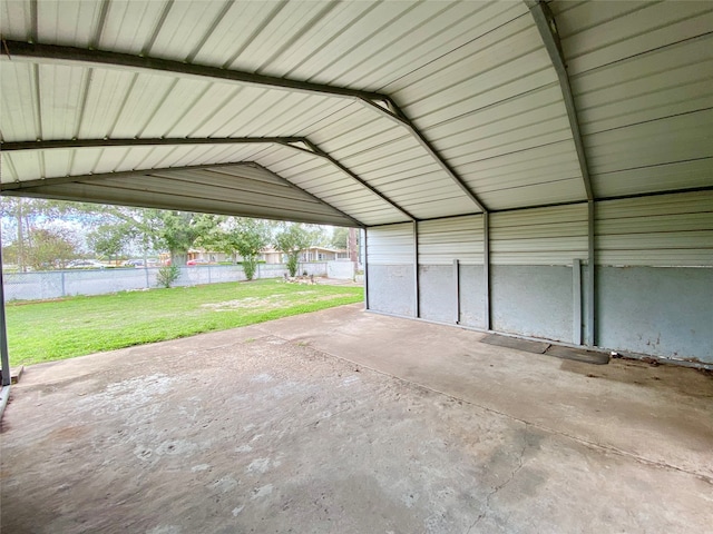 garage featuring a yard