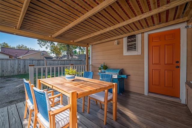 wooden terrace featuring grilling area