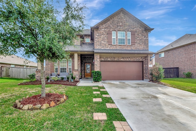 view of front of home with a garage and a front lawn