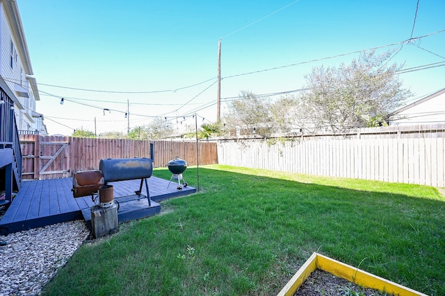 view of yard featuring a deck