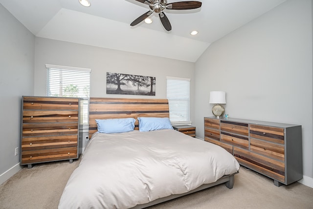 bedroom with carpet floors, ceiling fan, and lofted ceiling