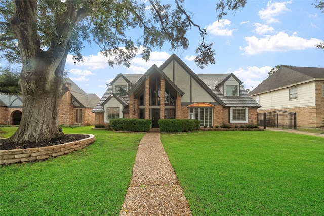 tudor house with a front yard