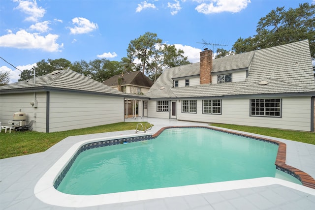 back of house featuring a patio area