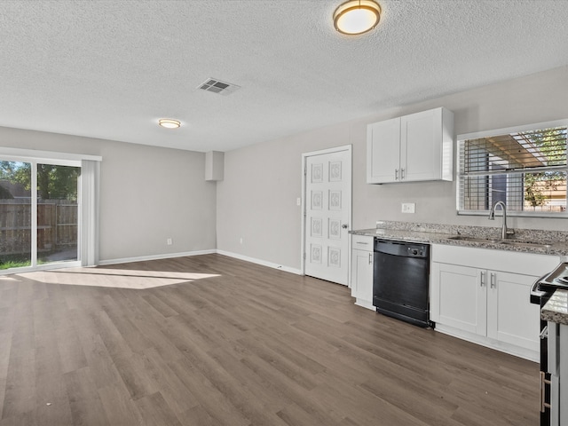 kitchen featuring dark hardwood / wood-style flooring, a textured ceiling, sink, white cabinets, and black dishwasher