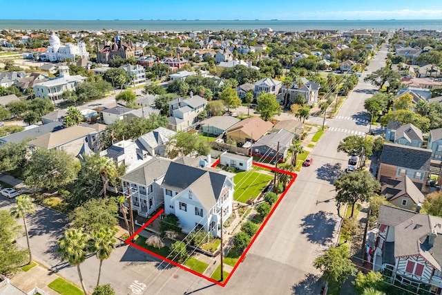 802 16th St, Galveston, TX 77550 - aerial perspective of suburban area featuring property parcel outlined and a large body of water
