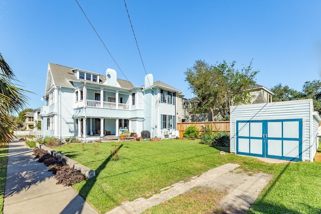 802 16th St, Galveston, TX 77550 - back of property featuring a balcony and covered porch