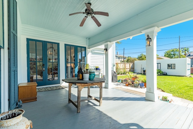 view of patio / terrace featuring ceiling fan, french doors, and a porch