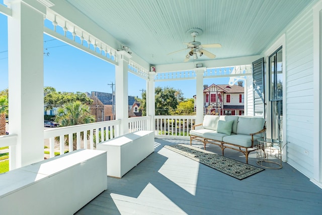 802 16th St, Galveston, TX 77550 - wooden deck featuring ceiling fan, an outdoor hangout area, and a residential view