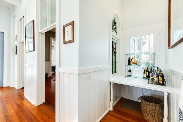 802 16th St, Galveston, TX 77550 - hallway with wainscoting and hardwood / wood-style flooring