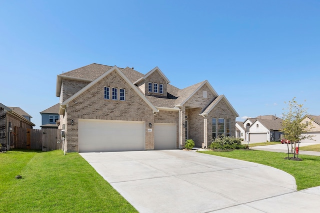 view of front facade featuring a garage and a front yard