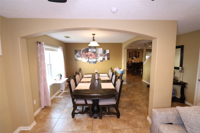 view of tiled dining area