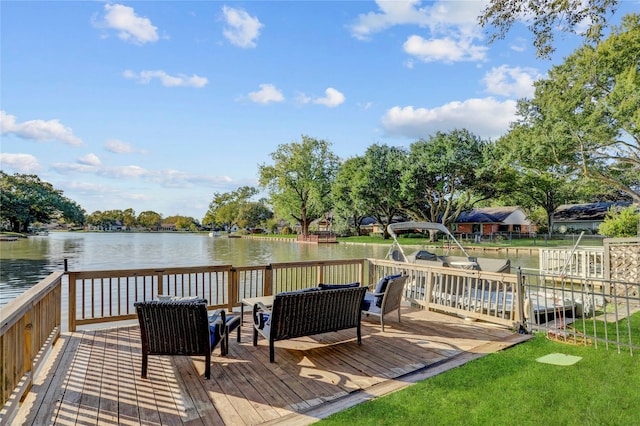 wooden terrace with outdoor lounge area and a water view