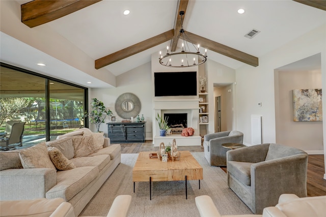 living room featuring a chandelier, beam ceiling, light wood-type flooring, and high vaulted ceiling