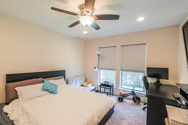 carpeted bedroom featuring ceiling fan