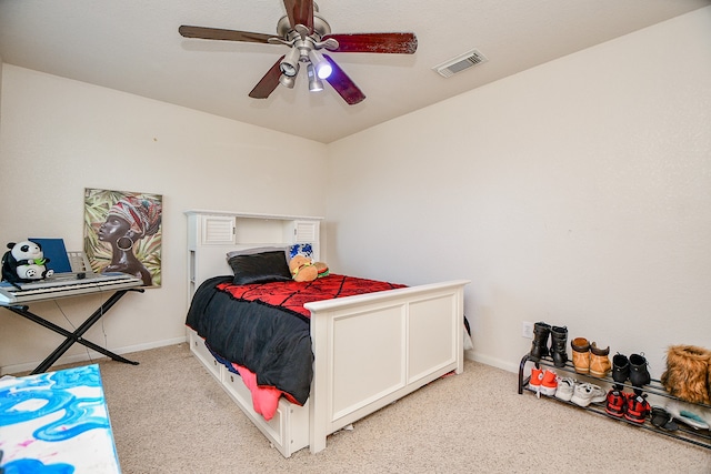 carpeted bedroom featuring ceiling fan