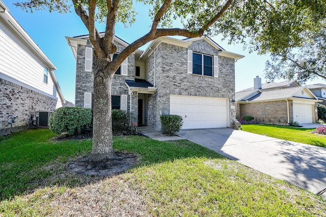 view of property featuring central AC, a front yard, and a garage