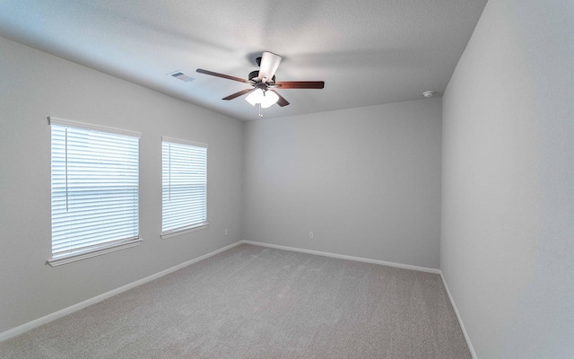 13101 Sapphire Lake Ln, Texas City, TX 77568 - carpeted empty room featuring ceiling fan and baseboards