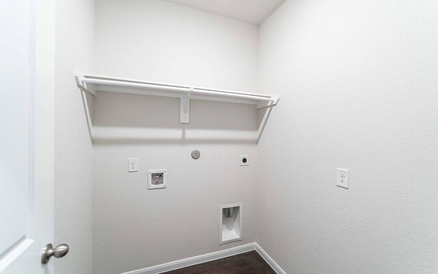 13101 Sapphire Lake Ln, Texas City, TX 77568 - laundry room with electric dryer hookup, gas dryer hookup, baseboards, and washer hookup