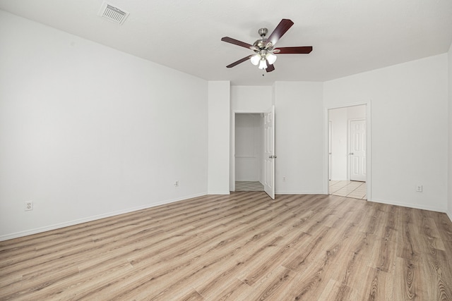 unfurnished bedroom featuring ceiling fan and light hardwood / wood-style flooring