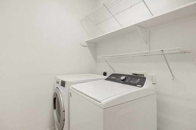 laundry area with washer and dryer