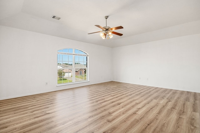 spare room with ceiling fan and light hardwood / wood-style flooring