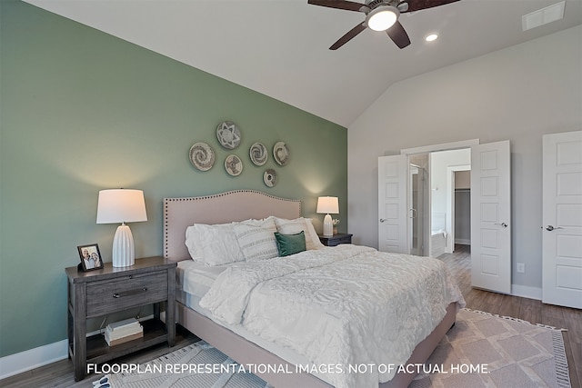 bedroom with hardwood / wood-style floors, ceiling fan, and lofted ceiling