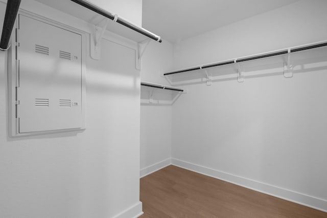 spacious closet with wood finished floors